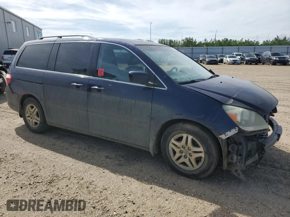 2006 Honda Odyssey EX-L z VIN 5FNRL38706B128265, wystawiony jako Copart lot #58715415 z przebiegiem 377 656 mil mil oraz Szkoda całkowita • Salvage title. Historia ofert i sprzedaży dostępna na DreamBid. Obrazek 4.