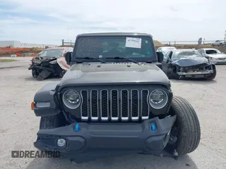 2022 Jeep Wrangler Unlimited Sahara with VIN 1C4JJXP69NW269462, listed as a IAAI auction lot 41759162 with 19,629 mi miles and . Bid and sale history available at DreamBid. Image 12.
