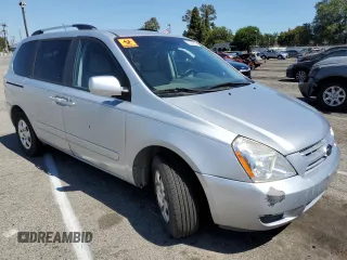 2009 Kia Sedona with VIN KNDMB133296299895, listed as a Copart auction lot 61930584 with 0 mi miles and Clean Title. Bid and sale history available at carsss.com. Image 4.