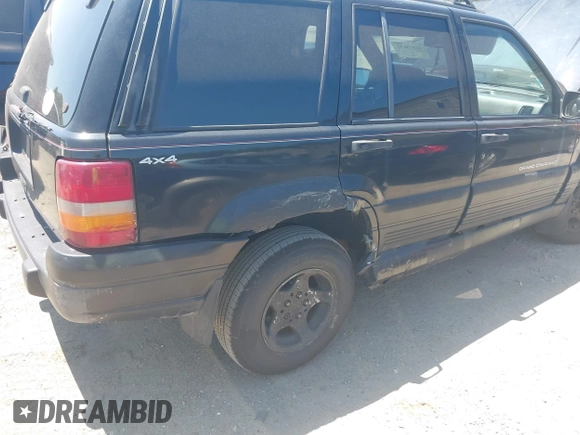 1997 Jeep Grand Cherokee Laredo with VIN 1J4GZ58S3VC508194, listed as a IAAI auction lot 42578622 with 146,559 mi miles and . Bid and sale history available at DreamBid. Image 4.