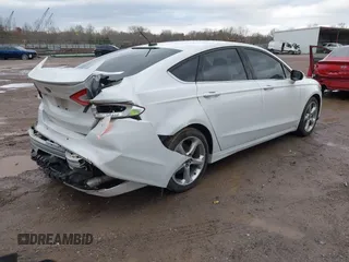 2014 Ford Fusion SE with VIN 3FA6P0HR3ER128514, listed as a IAAI auction lot 41579517 with 160,872 mi miles. Bid and sale history available at carsss.com. Image 4.