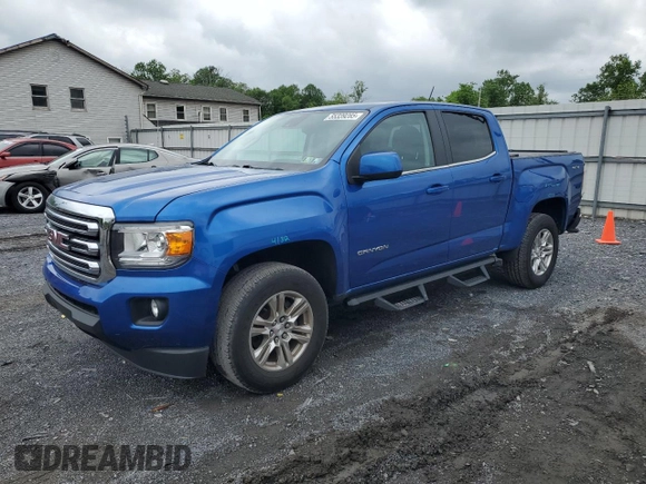 2019 GMC Canyon 4WD SLE z VIN 1GTG6CEN1K1206640, wystawiony jako Copart lot #55339285 z przebiegiem 52 166 mil mil oraz Szkody całkowita. Historia ofert i sprzedaży dostępna na DreamBid. Obrazek 1.