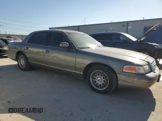 2002 Ford Crown Victoria Standard с VIN 2FAFP73WX2X103936, выставлен на аукционе Copart как лот 67688374 с пробегом 161 511 миль миль и Списание • Salvage title. История ставок и продаж доступна на DreamBid. Изображение 4.