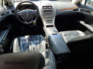 2015 Lincoln MKZ с VIN 3LN6L2JKXFR615351, выставлен на аукционе Copart как лот 64656985 с пробегом 100 515 миль миль и Списание • Salvage title. История ставок и продаж доступна на DreamBid. Изображение 8.