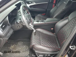 2023 Genesis G70 3.3T with VIN KMTG54TE1PU106024, listed as a Copart auction lot 70501604 with 24,470 mi miles and Salvage Title. Bid and sale history available at DreamBid. Image 7.