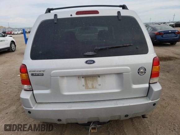 2004 Ford Escape Limited with VIN 1FMCU94184KB62778, listed as a Copart auction lot 70992184 with 165,199 mi miles and Salvage Title. Bid and sale history available at carsss.com. Image 6.
