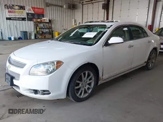 2012 Chevrolet Malibu LTZ with VIN 1G1ZG5E79CF111257, listed as a IAAI auction lot 42066475 with 163,282 mi miles and . Bid and sale history available at DreamBid. Image 2.