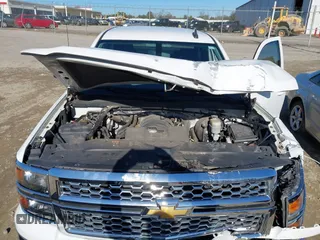 2015 Chevrolet Silverado 1500 LT with VIN 3GCPCREH3FG125975, listed as a IAAI auction lot 41459150 with 217,012 mi miles and . Bid and sale history available at DreamBid. Image 10.