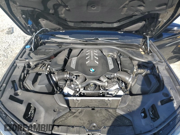 2023 BMW 5 Series M550i xDrive z VIN WBA13BK08PCM88687, wystawiony jako Copart lot #88633545 z przebiegiem Nie podano mil oraz Szkoda całkowita • Salvage title. Historia ofert i sprzedaży dostępna na DreamBid. Obrazek 12.