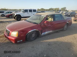2003 Cadillac DeVille DHS z VIN 1G6KE54Y93U128406, wystawiony jako Copart lot #73549224 z przebiegiem 172 780 mil mil oraz Szkoda całkowita • Salvage title. Historia ofert i sprzedaży dostępna na DreamBid. Obrazek 1.
