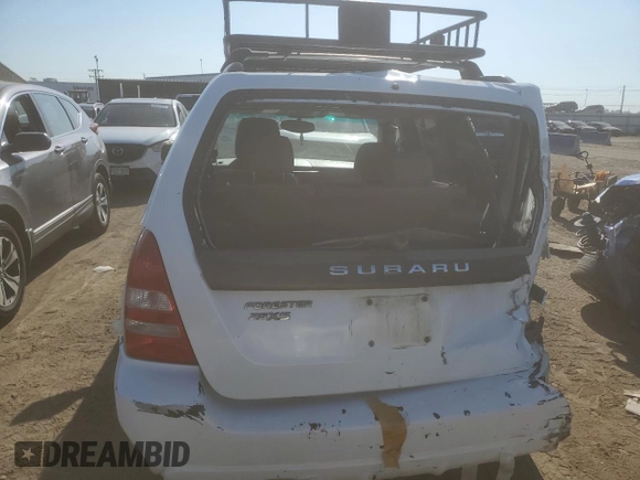 2003 Subaru Forester XS with VIN JF1SG65693H736595, listed as a Copart auction lot 69282034 with 102,253 mi miles and Salvage Title. Bid and sale history available at carsss.com. Image 6.