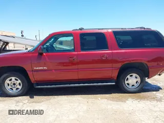 2003 GMC Yukon XL SLT z VIN 1GKEC16Z63J166423, wystawiony jako IAAI lot #42330690 z przebiegiem 190 589 mil mil oraz . Historia ofert i sprzedaży dostępna na DreamBid. Obrazek 14.