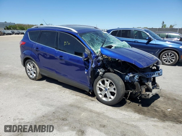 2015 Ford Escape Titanium with VIN 1FMCU9J90FUA70923, listed as a Copart auction lot 49832155 with 142,600 mi miles and Salvage title. Bid and sale history available at DreamBid. Image 4.