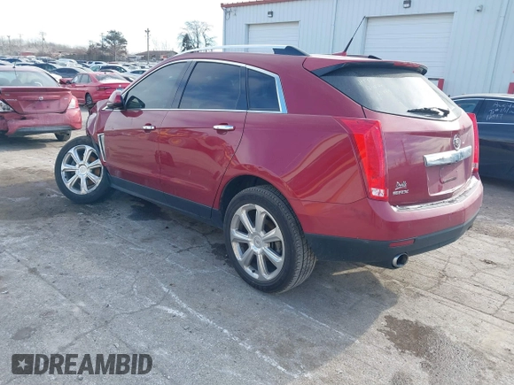2013 Cadillac SRX Performance Collection with VIN 3GYFNDE3XDS540695, listed as a IAAI auction lot 41278568 with 137,024 mi miles and . Bid and sale history available at DreamBid. Image 3.