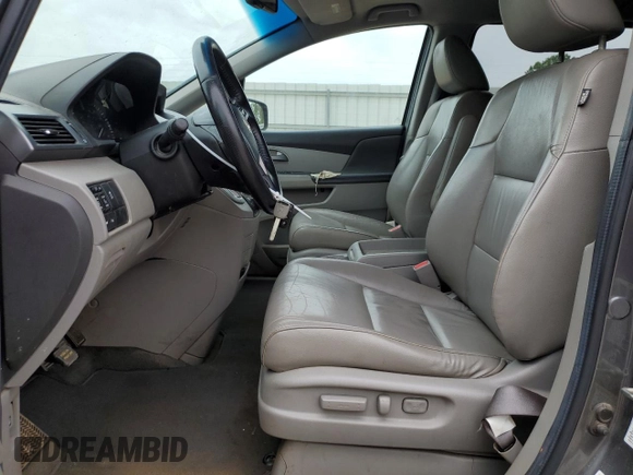 2012 Honda Odyssey Touring with VIN 5FNRL5H96CB045514, listed as a Copart auction lot 54698355 with 217,787 mi miles and Clean Title. Bid and sale history available at DreamBid. Image 7.