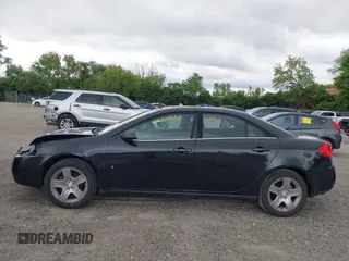2009 Pontiac G6 1SA z VIN 1G2ZG57B594132964, wystawiony jako IAAI lot #42330133 z przebiegiem 139 695 mil mil oraz . Historia ofert i sprzedaży dostępna na DreamBid. Obrazek 14.