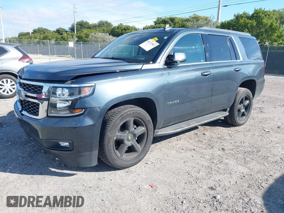 2020 Chevrolet Tahoe LT with VIN 1GNSCBKC4LR246060, listed as a IAAI auction lot 41272902 with 105,417 mi miles and . Bid and sale history available at DreamBid. Image 16.
