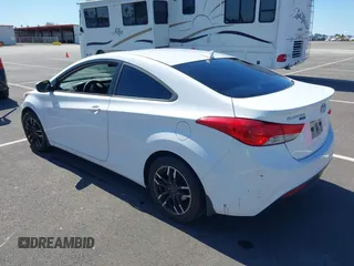 2013 Hyundai Elantra Coupe SE with VIN KMHDH6AE9DU022676, listed as a IAAI auction lot 41816486 with 158,326 mi miles. Bid and sale history available at carsss.com. Image 3.