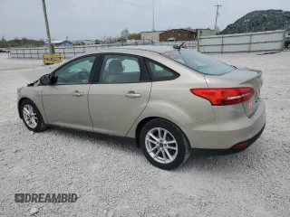 2016 Ford Focus SE z VIN 1FADP3F20GL267077, wystawiony jako Copart lot #53649665 z przebiegiem 106 329 mil mil oraz Szkoda całkowita • Salvage title. Historia ofert i sprzedaży dostępna na DreamBid. Obrazek 2.