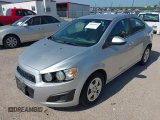 2013 Chevrolet Sonic LS with VIN 1G1JA5SH1D4246936, listed as a IAAI auction lot 42665664 with 124,464 mi miles and . Bid and sale history available at DreamBid. Image 2.
