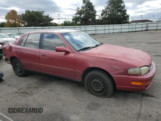 1993 Toyota Camry LE with VIN 4T1SK12E8PU240803, listed as a Copart auction lot 76663004 with 214,911 mi miles and Salvage Title. Bid and sale history available at carsss.com. Image 4.