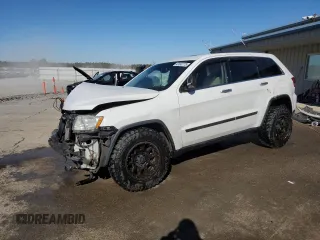 2013 Jeep Grand Cherokee Overland with VIN 1C4RJECG1DC525986, listed as a Copart auction lot 42040775 with 148,784 mi miles and Salvage Title. Bid and sale history available at carsss.com. Image 1.