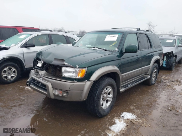 2000 Toyota 4Runner Limited with VIN JT3HN87R6Y0265299, listed as a IAAI auction lot 41569862 with 216,917 mi miles. Bid and sale history available at carsss.com. Image 2.