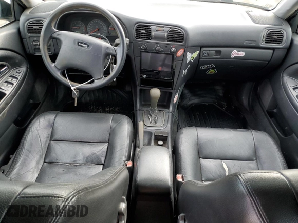 2001 Volvo V40 z VIN YV1VW29581F738166, wystawiony jako Copart lot #86166264 z przebiegiem 83 518 mil mil oraz Tytuł czysty. Historia ofert i sprzedaży dostępna na DreamBid. Obrazek 8.