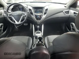 2013 Hyundai Veloster w/Black Int with VIN KMHTC6ADXDU121105, listed as a Copart auction lot 55171015 with 130,905 mi miles and Salvage title. Bid and sale history available at DreamBid. Image 8.