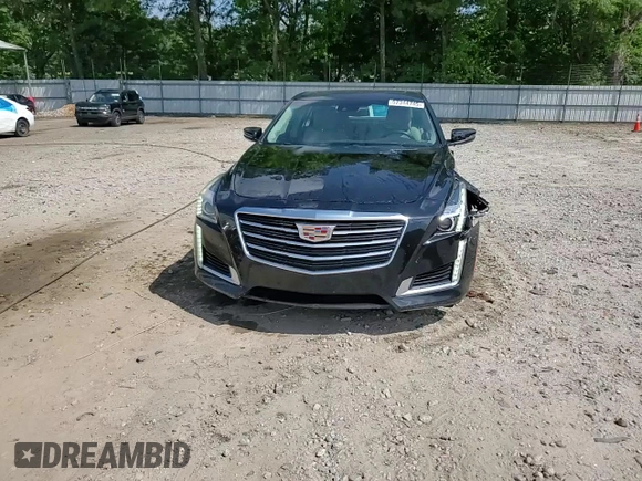 2016 Cadillac CTS Luxury Collection RWD z VIN 1G6AR5SX5G0106572, wystawiony jako Copart lot #57314745 z przebiegiem 129 830 mil mil oraz Szkoda całkowita • Salvage title. Historia ofert i sprzedaży dostępna na DreamBid. Obrazek 13.