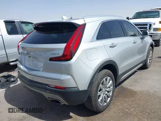 2021 Cadillac XT4 FWD Premium Luxury with VIN 1GYFZCR42MF005253, listed as a IAAI auction lot 40470700 with 70,571 mi miles and . Bid and sale history available at carsss.com. Image 4.
