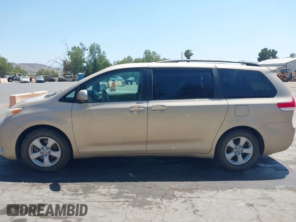2012 Toyota Sienna LE AAS with VIN 5TDKK3DC5CS186077, listed as a IAAI auction lot 40265988 with 130,888 mi miles and . Bid and sale history available at DreamBid. Image 14.
