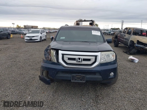 2011 Honda Pilot EX with VIN 5FNYF4H41BB004997, listed as a IAAI auction lot 40505560 with 141,487 mi miles. Bid and sale history available at carsss.com. Image 12.