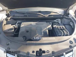 2014 Cadillac SRX Premium Collection with VIN 3GYFNDE37ES574109, listed as a IAAI auction lot 41770404 with 66,478 mi miles and . Bid and sale history available at DreamBid. Image 10.