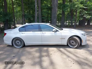 2013 BMW 7 Series 750Li with VIN WBAYE8C55DDS16013, listed as a IAAI auction lot 42709519 with 123,405 mi miles and . Bid and sale history available at DreamBid. Image 13.