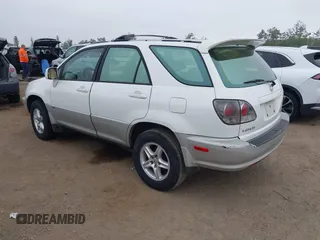 2001 Lexus RX 300 with VIN JTJGF10U010092702, listed as a IAAI auction lot 42489593 with 215,966 mi miles and . Bid and sale history available at DreamBid. Image 3.