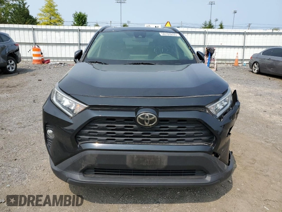 2019 Toyota RAV4 XLE with VIN JTMP1RFV8KJ001784, listed as a Copart auction lot 59109235 with 98,858 mi miles and Salvage title. Bid and sale history available at DreamBid. Image 5.