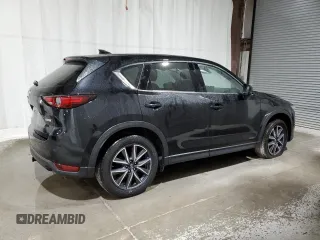 2018 Mazda CX-5 Grand Touring with VIN JM3KFBDM1J0440947, listed as a Copart auction lot 48579825 with 63,164 mi miles and Non Repairable. Bid and sale history available at carsss.com. Image 3.
