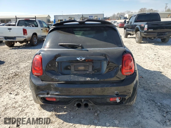 2016 MINI Hardtop S with VIN WMWXP7C55G3B49216, listed as a Copart auction lot 50579275 with 107,977 mi miles and Salvage Title. Bid and sale history available at DreamBid. Image 6.