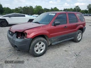 2006 Ford Escape XLT with VIN 1FMYU03116KA97732, listed as a Copart auction lot 58969735 with Not provided miles and Salvage title. Bid and sale history available at DreamBid. Image 1.