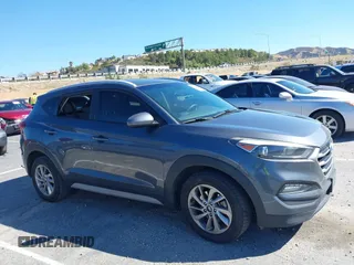2018 Hyundai Tucson SEL with VIN KM8J3CA42JU618764, listed as a IAAI auction lot 41677046 with 127,980 mi miles. Bid and sale history available at carsss.com. Image 13.