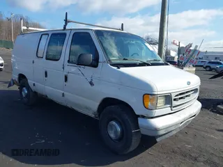 2001 Ford Econoline Cargo with VIN 1FTNE24221HB32842, listed as a IAAI auction lot 41677717 with 221,642 mi miles. Bid and sale history available at carsss.com. Image 1.