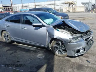 2022 Honda Insight EX with VIN 19XZE4F54NE008068, listed as a IAAI auction lot 41658247 with 54,480 mi miles and . Bid and sale history available at DreamBid. Image 1.