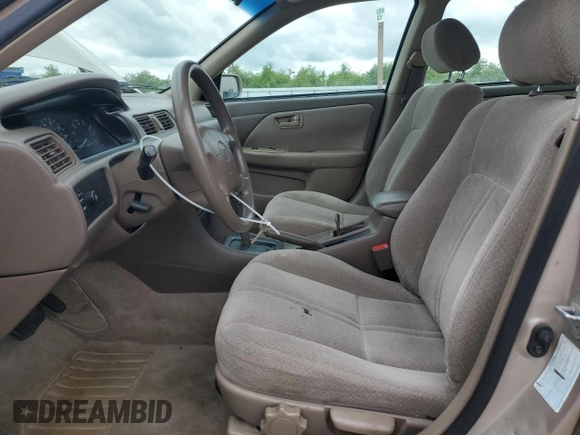 2000 Toyota Camry CE with VIN 4T1BG22K1YU621861, listed as a Copart auction lot 51611275 with 153,153 mi miles and Salvage Title. Bid and sale history available at carsss.com. Image 6.