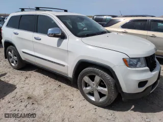 2012 Jeep Grand Cherokee Overland with VIN 1C4RJFCG9CC199486, listed as a Copart auction lot 51942135 with 113,098 mi miles and Salvage Title. Bid and sale history available at carsss.com. Image 4.