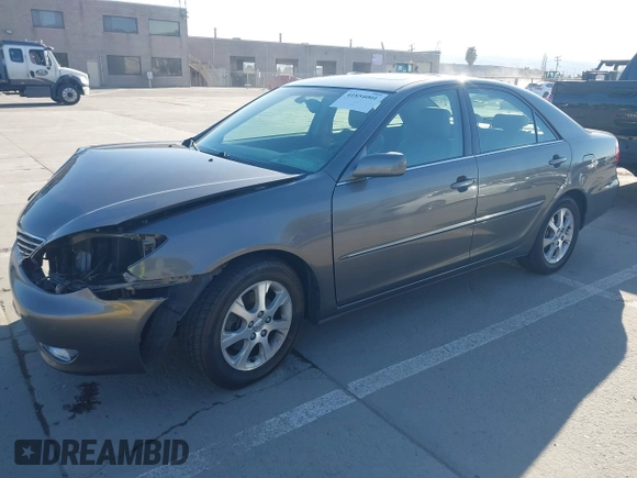 2005 Toyota Camry LE with VIN 4T1BF30K55U619313, listed as a IAAI auction lot 41854001 with 89,982 mi miles and . Bid and sale history available at DreamBid. Image 2.