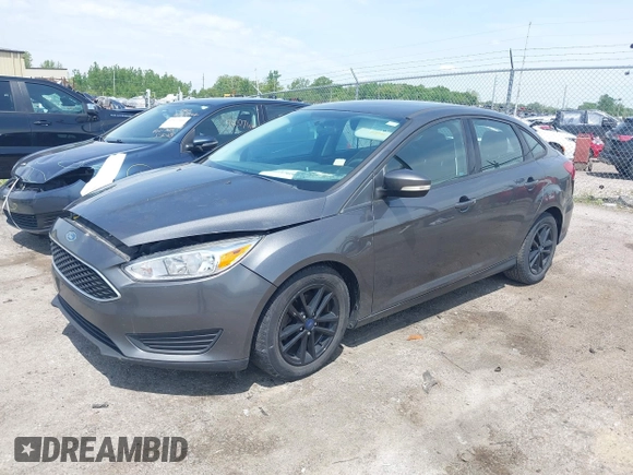 2017 Ford Focus SE with VIN 1FADP3F2XHL235013, listed as a IAAI auction lot 42370565 with 112,276 mi miles and . Bid and sale history available at DreamBid. Image 2.