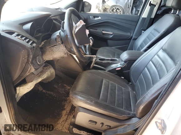2016 Ford Escape Titanium with VIN 1FMCU9J91GUA11090, listed as a Copart auction lot 54231675 with 135,735 mi miles and Salvage Title. Bid and sale history available at DreamBid. Image 7.