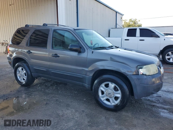 2004 Ford Escape XLT with VIN 1FMYU03154KA96127, listed as a Copart auction lot 71851434 with 168,773 mi miles and Salvage Title. Bid and sale history available at carsss.com. Image 4.
