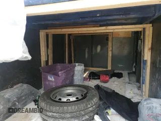 2018 Ford Transit z VIN 1FTYR2CM8JKA50248, wystawiony jako Copart lot #58839725 z przebiegiem 102 133 mil mil oraz Szkoda całkowita • Salvage title. Historia ofert i sprzedaży dostępna na DreamBid. Obrazek 11.